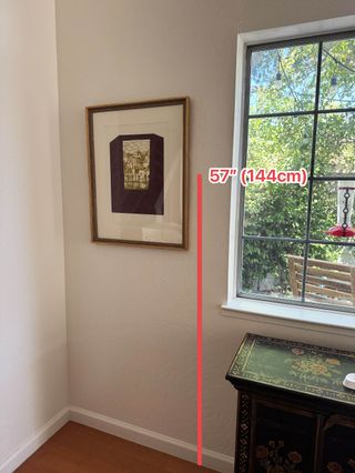 Art hung at 57 inches